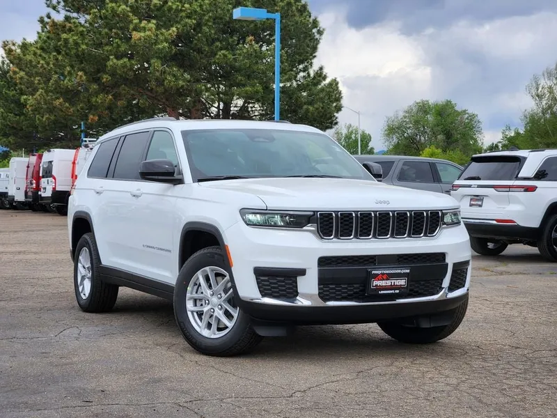 2026 Jeep Grand Cherokee L GRAND CHEROKEE L LAREDO X 4X4 in Bright White Clear-Coat Exterior Paint — front three-quarter view