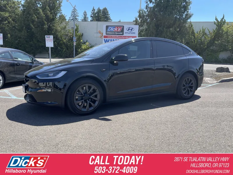 2023 Tesla Model X AWD in Other — front three-quarter view