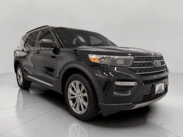 2024 Ford Explorer XLT 4WD in Agate Black Metallic — front three-quarter view