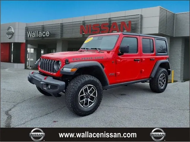 2025 Jeep Wrangler Rubicon in Firecracker Red Clearcoat — front three-quarter view