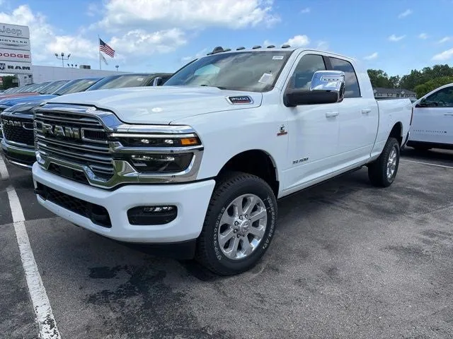 2026 RAM Ram 2500 RAM 2500 LARAMIE MEGA CAB 4X4 6'4' BOX in Bright White Clear-Coat Exterior Paint — front three-quarter view