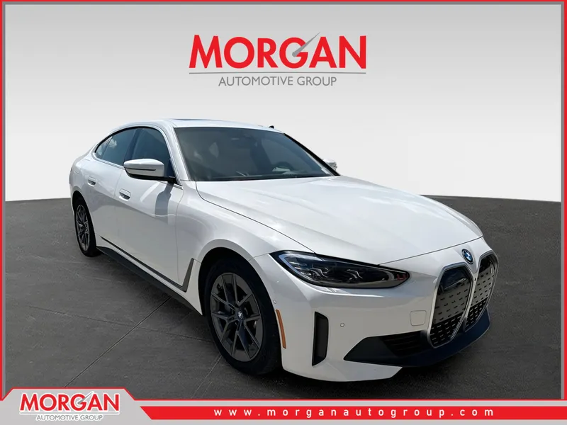 2024 BMW i4 xDrive40 in Alpine White — front three-quarter view