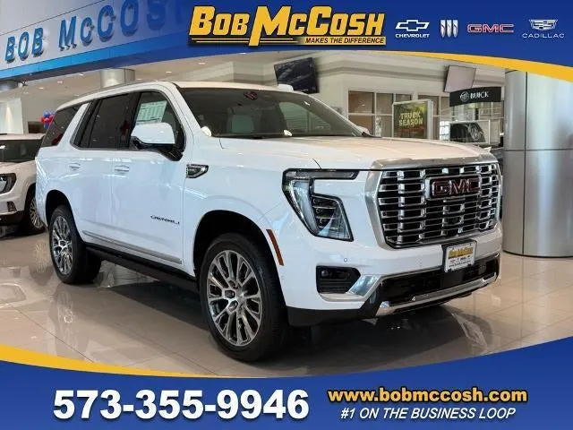 2026 GMC Yukon Denali in Summit White — front three-quarter view