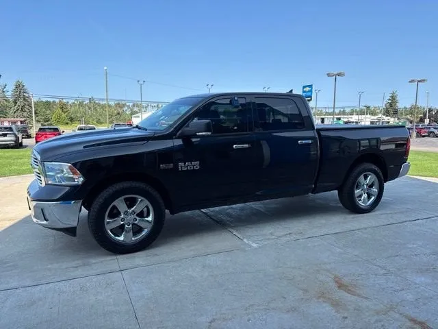 2018 RAM 1500 SLT in Black — front three-quarter view