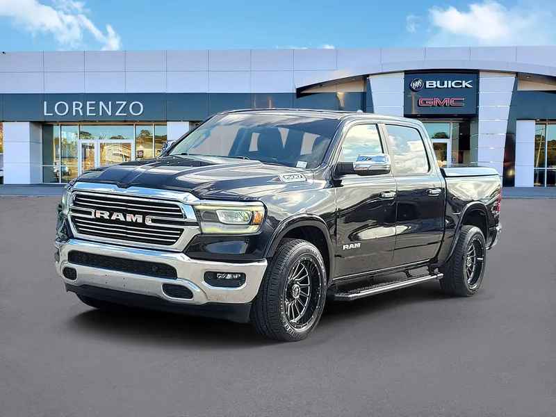 2021 RAM 1500 Laramie in Diamond Black Crystal Pearlcoat — front three-quarter view