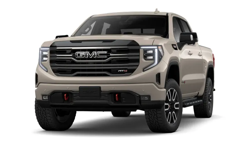 2026 GMC Sierra 1500 AT4 in Coastal Dune — front three-quarter view