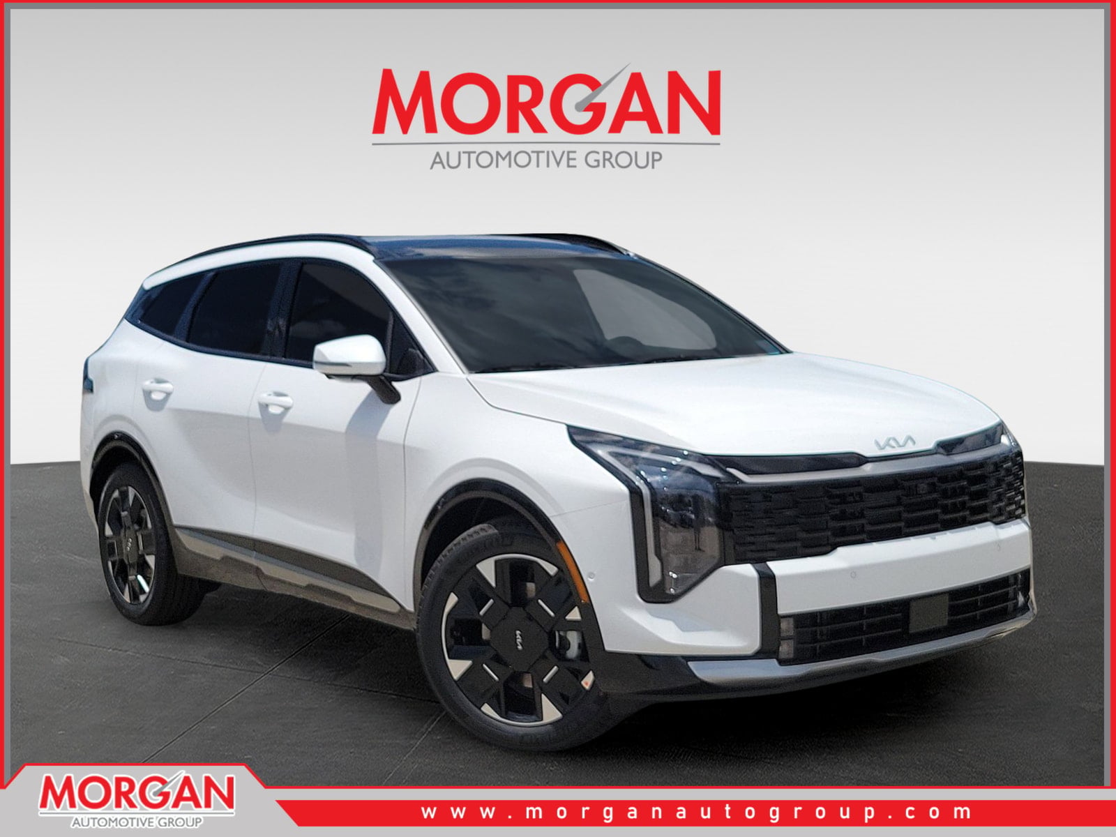 2026 Kia Sportage SX-Prestige in Glacial White Pearl — front three-quarter view