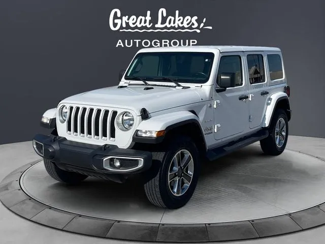 2022 Jeep Wrangler Unlimited Sahara in Bright White Clearcoat — front three-quarter view