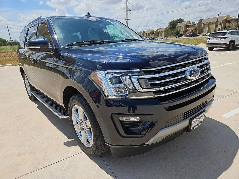 2021 Ford Expedition XLT in Blue Metallic — front three-quarter view