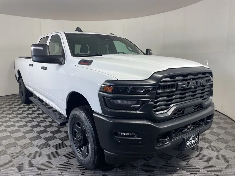 2026 RAM 2500 RAM 2500 TRADESMAN CREW CAB 4X4 8' BOX in Bright White Clear-Coat Exterior Paint — front three-quarter view