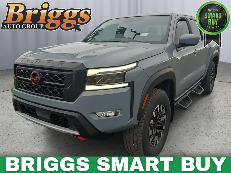 2023 Nissan Frontier PRO-4X in Boulder Gray Pearl — front three-quarter view
