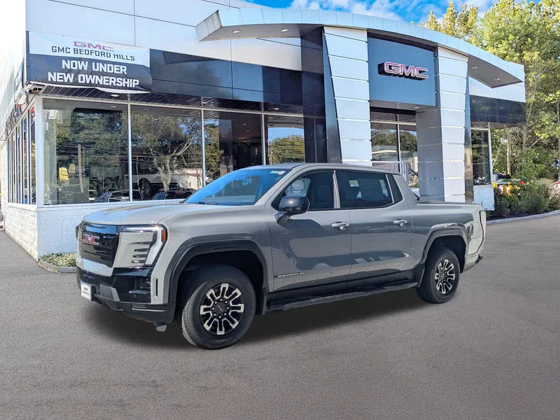 2026 GMC Sierra EV Standard Range Elevation in Thunderstorm Gray — front three-quarter view