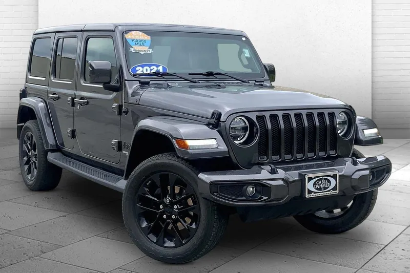 2021 Jeep Wrangler Unlimited Sahara High Altitude in Billet Silver Met — front three-quarter view