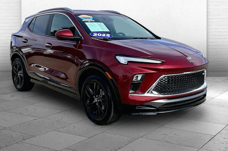 2025 Buick Encore GX Sport Touring in Cinnabar Metallic — front three-quarter view