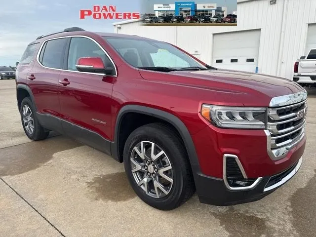 2023 GMC Acadia SLT in Volcanic Red Tintcoat — front three-quarter view
