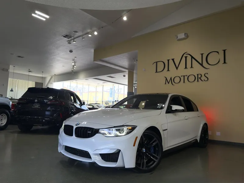 2018 BMW M3 in White — front three-quarter view