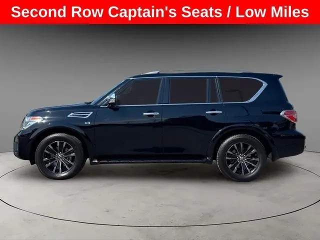 2020 Nissan Armada Platinum in Super Black — front three-quarter view