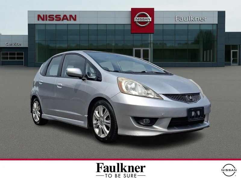 2011 Honda Fit Manual Sport in Alabaster Silver Metallic — front three-quarter view