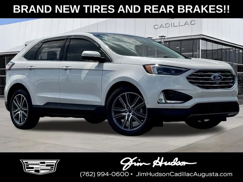 2019 Ford Edge Titanium in White Platinum Clearcoat Metallic — front three-quarter view