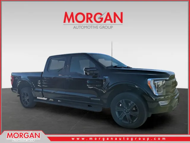 2023 Ford F-150 Lariat in Black — front three-quarter view