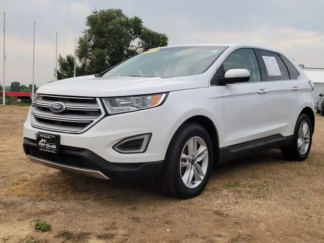2017 Ford Edge SEL in White — front three-quarter view