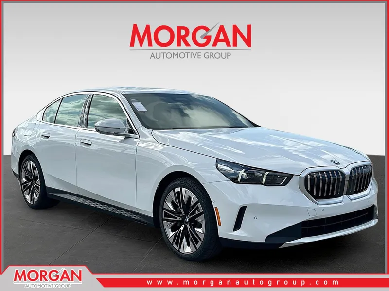 2026 BMW 5 Series 530i in Alpine White — front three-quarter view