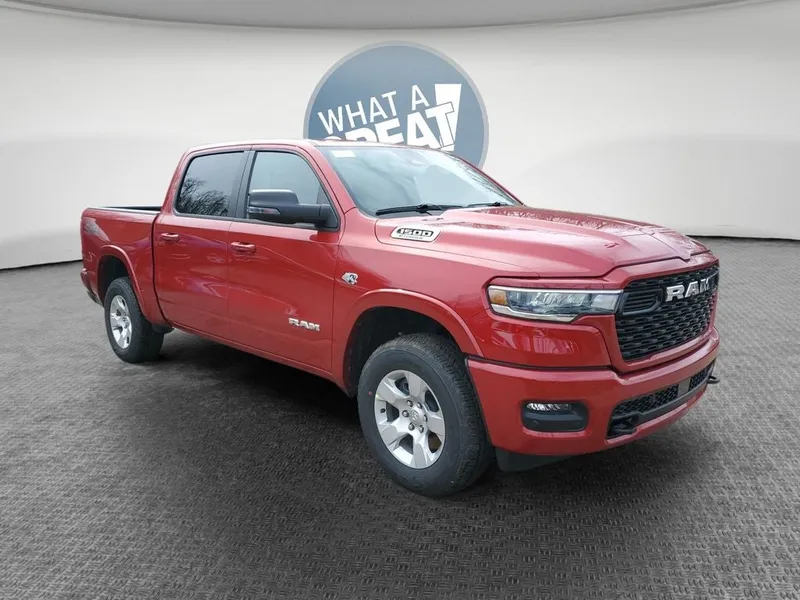 2026 RAM 1500 RAM 1500 BIG HORN CREW CAB 4X4 5'7' BOX in Molten Red Pearl-Coat Exterior Paint — front three-quarter view