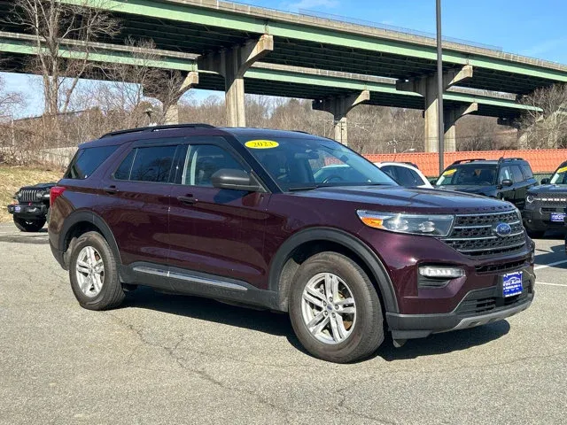 2023 Ford Explorer XLT in Red Metallic — front three-quarter view