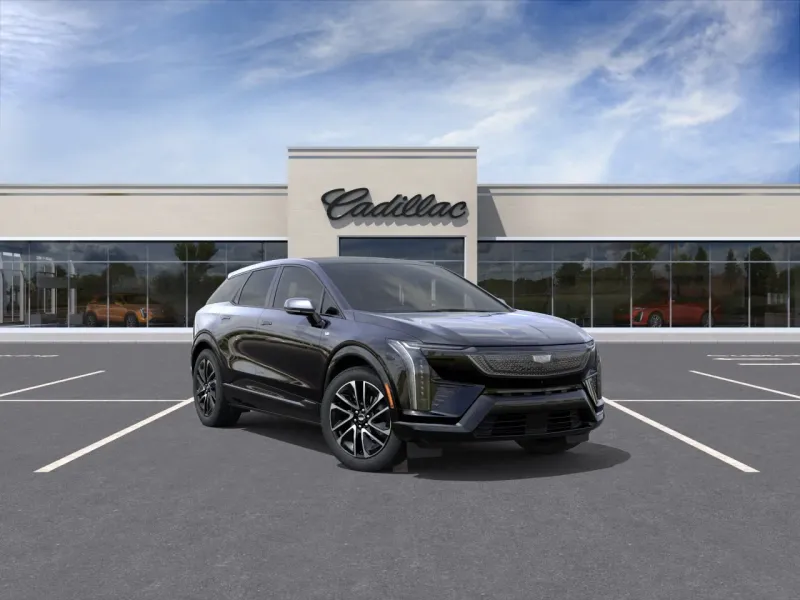 2026 Cadillac OPTIQ Sport in Black Raven — front three-quarter view