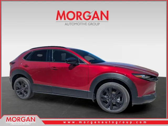 2026 Mazda CX-30 2.5 Turbo Premium Plus in Soul Red Crystal Metallic — front three-quarter view