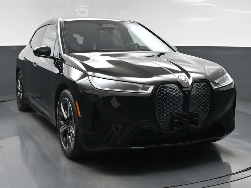 2023 BMW iX xDrive50 in Black — front three-quarter view