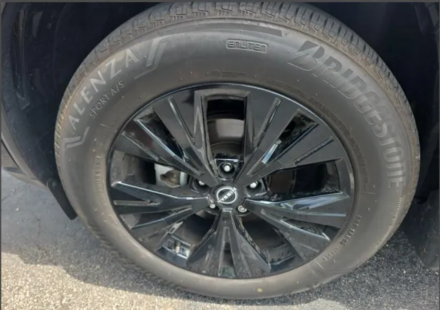 2023 Nissan Rogue SV in Super Black — front three-quarter view