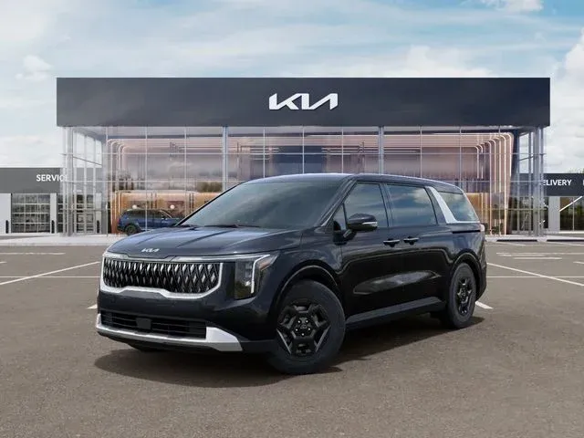 2026 Kia Carnival LX in Panthera Metal — front three-quarter view