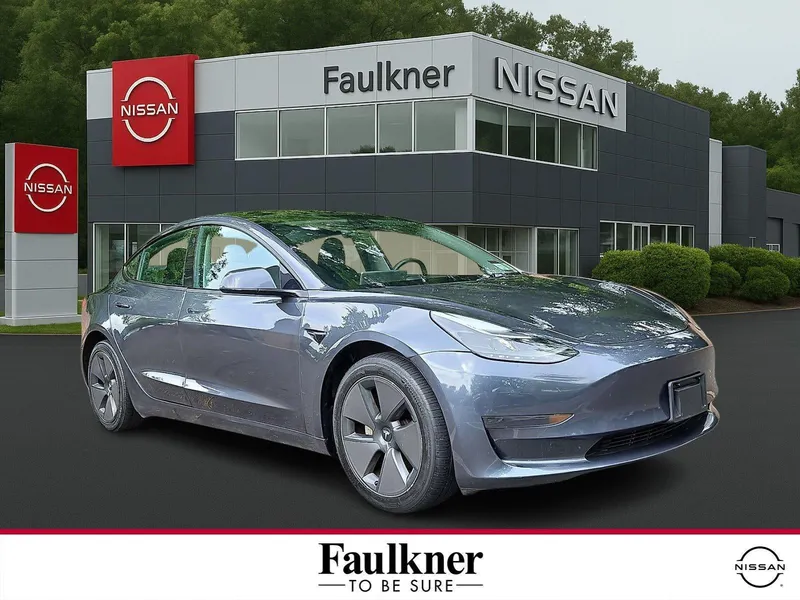 2023 Tesla Model 3 RWD in Midnight Silver Metallic — front three-quarter view