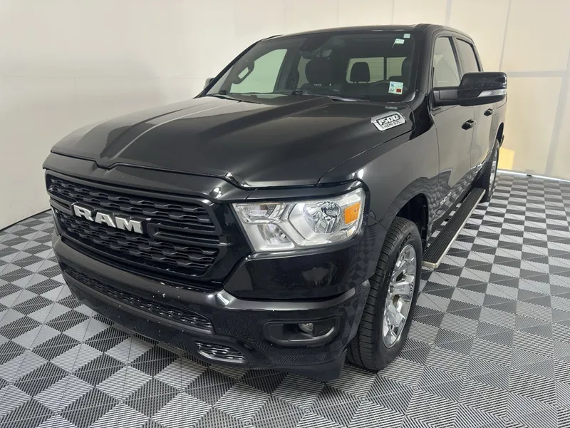 2022 RAM 1500 Big Horn in Black — front three-quarter view