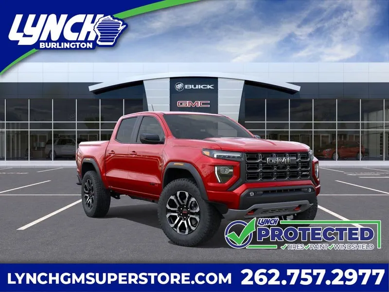 2026 GMC Canyon AT4 in Volcanic Red Tintcoat — front three-quarter view