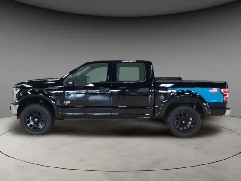 2018 Ford F-150 XLT in Shadow Black — front three-quarter view