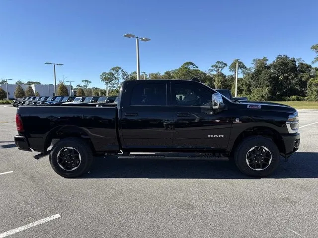 2026 RAM 2500 Laramie in Diamond Black Crystal Pearlcoat — front three-quarter view