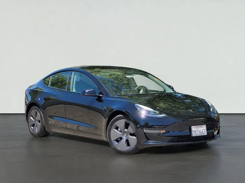2023 Tesla MODEL 3 BASE in Black — front three-quarter view