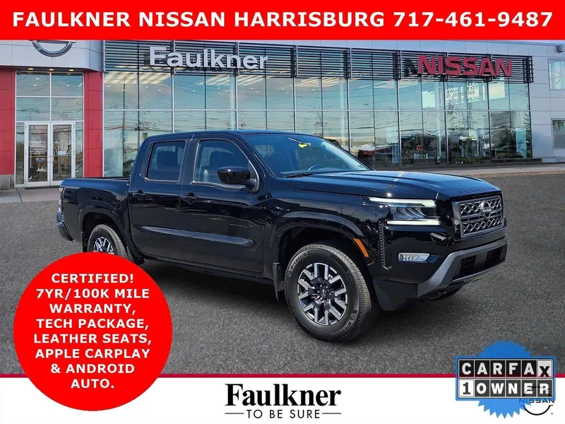 2024 Nissan Frontier Crew Cab SL in Black — front three-quarter view