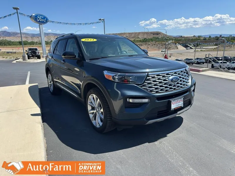 2023 Ford Explorer Platinum in Stone Blue Metallic — front three-quarter view