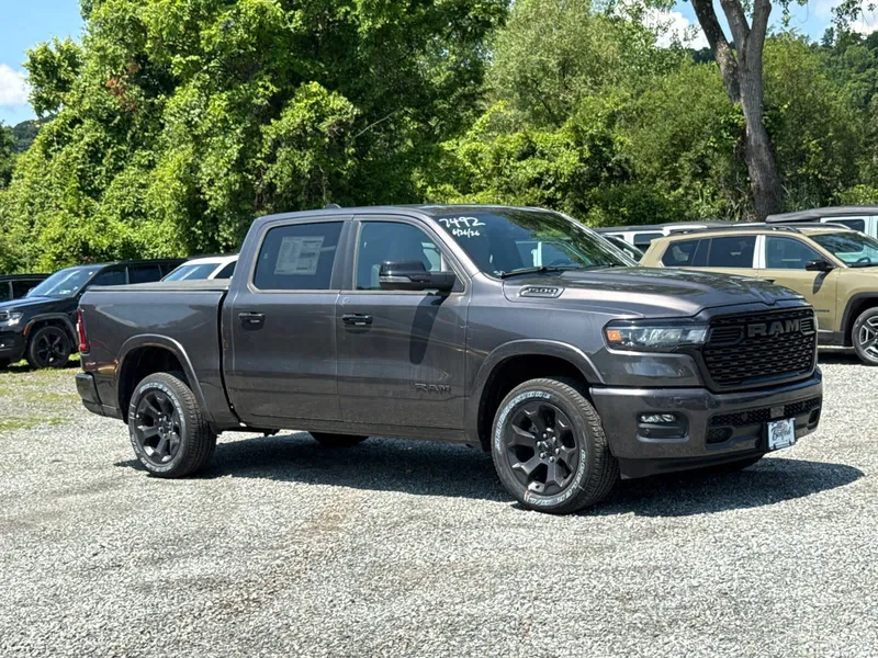 2026 RAM 1500 Big Horn in Granite Crystal Metallic Clearcoat — front three-quarter view