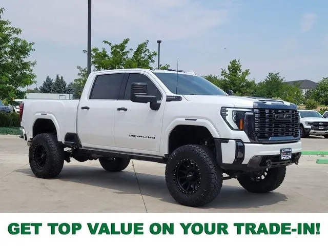 2024 GMC Sierra 2500HD Denali Ultimate in White Frost Tricoat — front three-quarter view