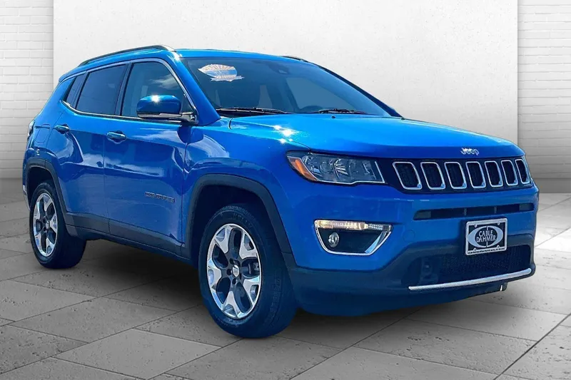 2021 Jeep Compass Limited in Laser Blue Pearlc — front three-quarter view