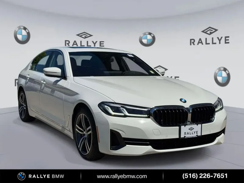 2023 BMW 5 Series 530i xDrive in Alpine White — front three-quarter view
