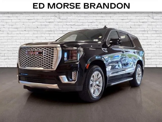 2024 GMC Yukon Denali in Onyx Black — front three-quarter view