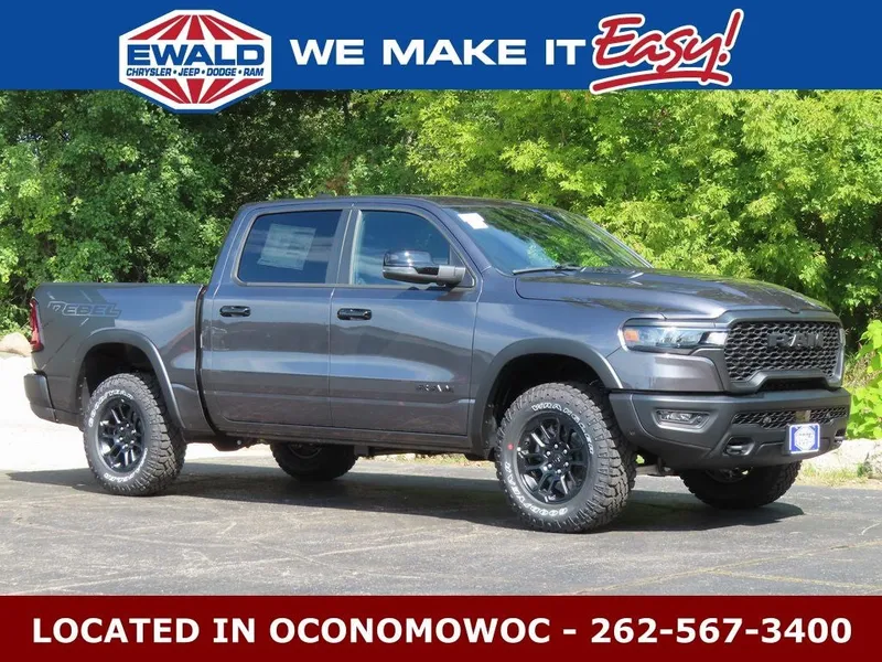 2026 RAM 1500 RAM 1500 REBEL CREW CAB 4X4 5'7' BOX in Granite Crystal Metallic Clear-Coat Exterior Paint — front three-quarter view