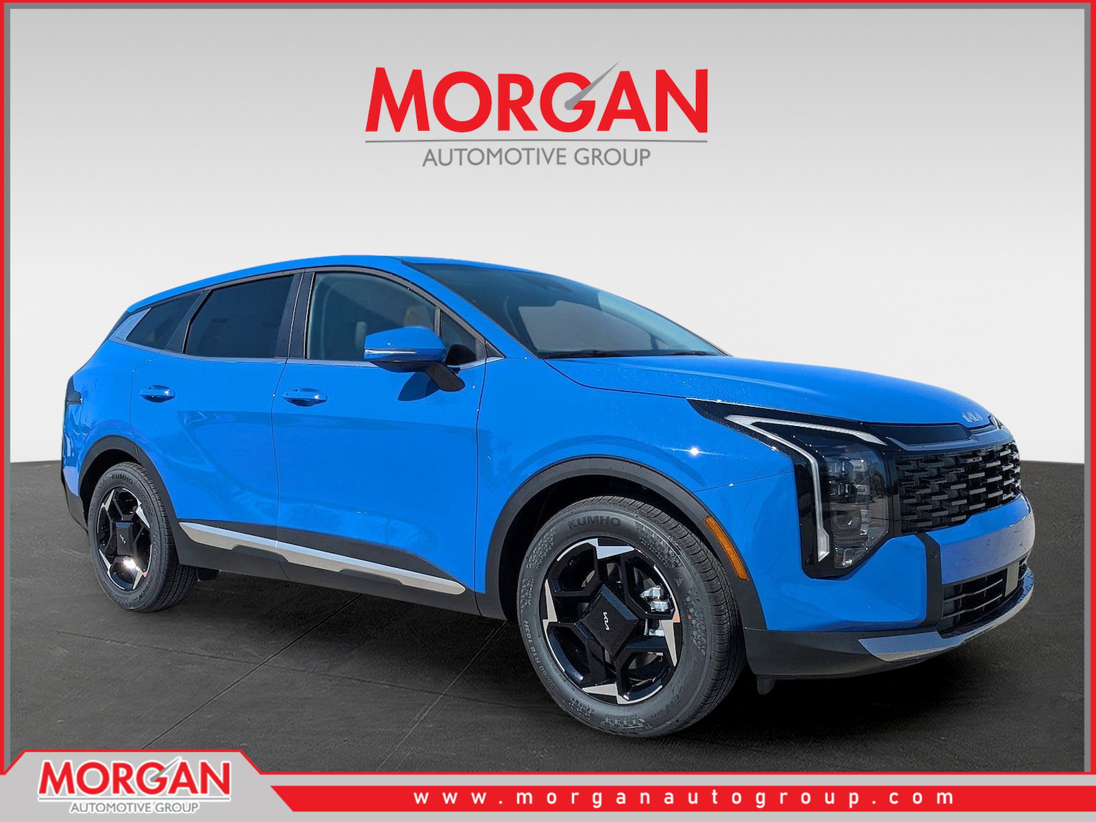 2026 Kia Sportage EX in Nebular Blue — front three-quarter view