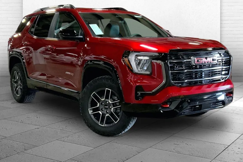 2026 GMC Terrain AT4 in Volcanic Red Tintcoat — front three-quarter view