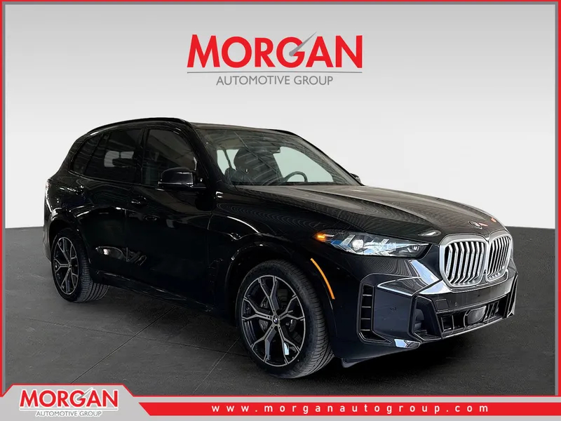 2026 BMW X5 xDrive50e in Black Sapphire Metallic — front three-quarter view